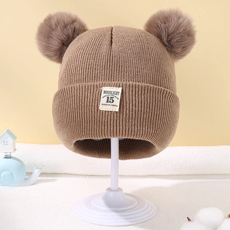 Baby wintermuts – gebreide beanie met pompon – unisex