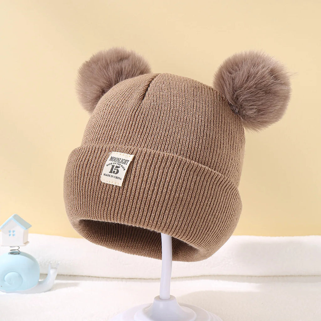Baby wintermuts – gebreide beanie met pompon – unisex