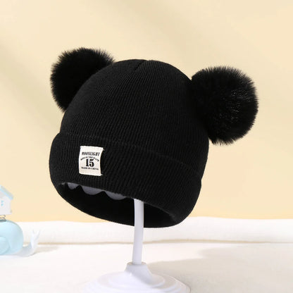 Baby wintermuts – gebreide beanie met pompon – unisex