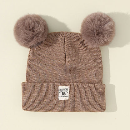 Baby wintermuts – gebreide beanie met pompon – unisex