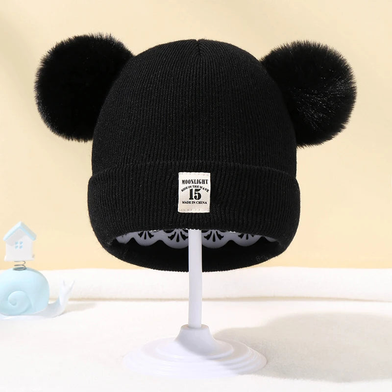 Baby wintermuts – gebreide beanie met pompon – unisex